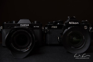 The digital Fujifilm X-T10 next to the analog Nikon FM2.